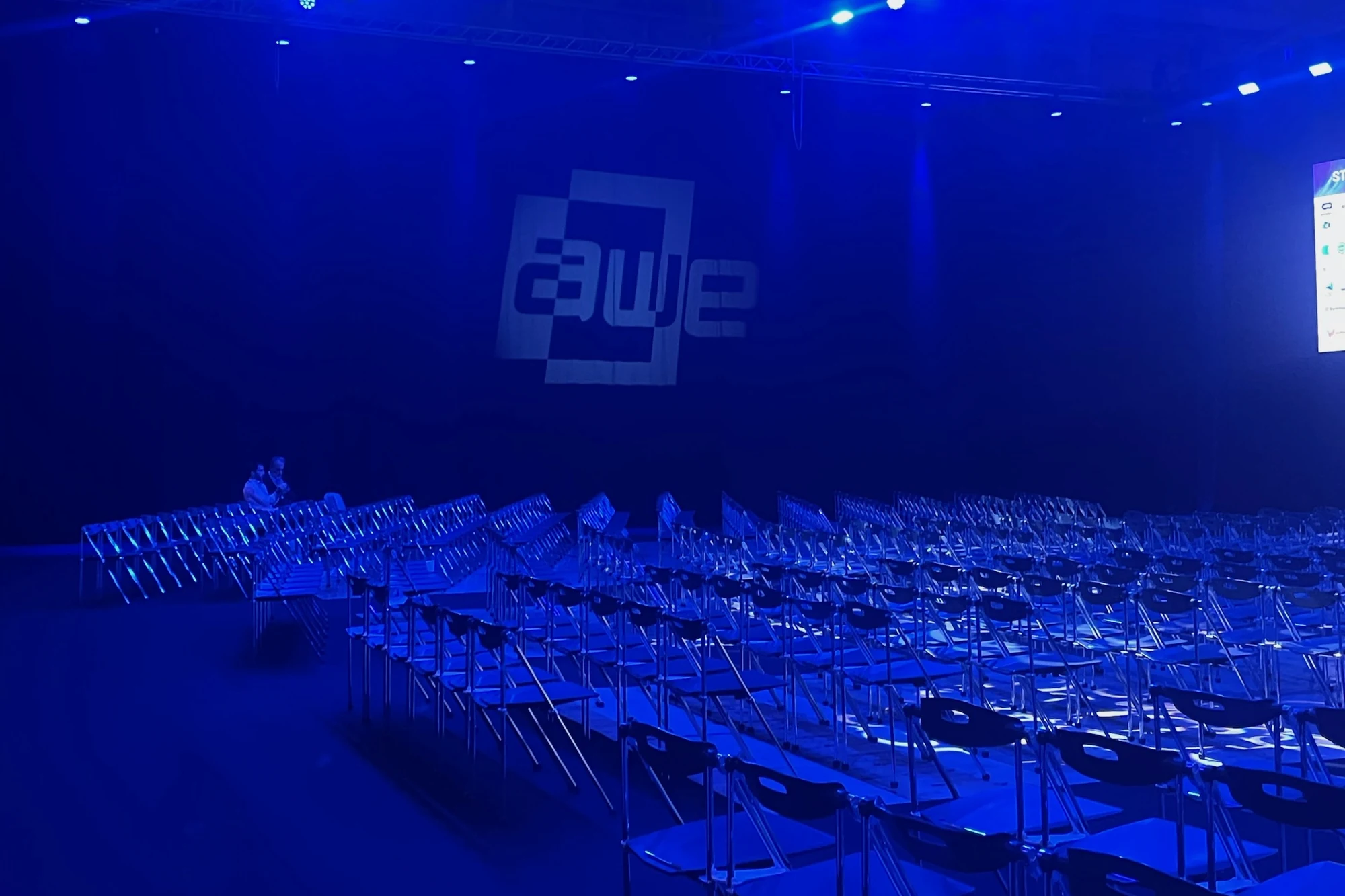 The AWE EU 2022 auditorium lit in blue before the session